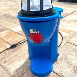 Very unique Peanuts collection piece, that is useful! One cup coffee maker.